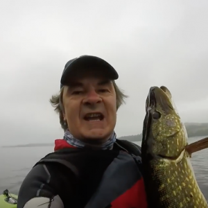 Kayak fishing adventure on Loch Lomond , Scotland .