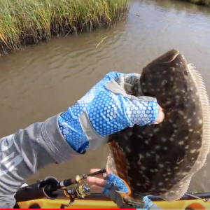 Grinding for flounder, Kayak fishing Texas Marsh