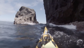 Sea Kayaking through a narrow gap - St Kilda, Isle of Soay