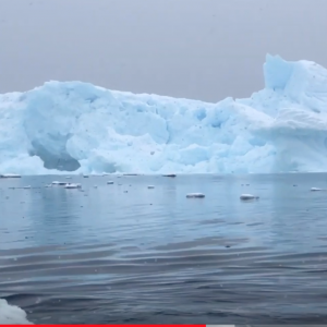 Kayaking in Antarctica! ... Iceberg calves!