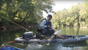 Catching a river monster on a kayak