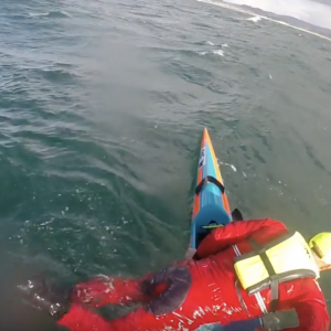 Remounting an elite surfski in extreme conditions